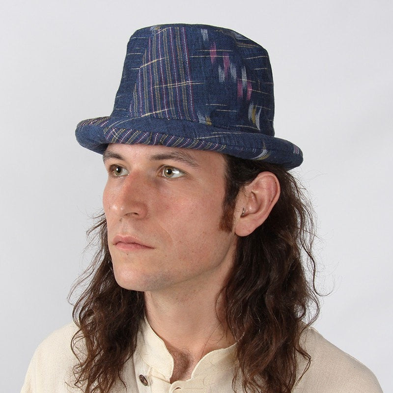 Rolled brim trilby style hat in one colour but patchwork two patterns, one striped, one brush strokes - Navy, Modelled