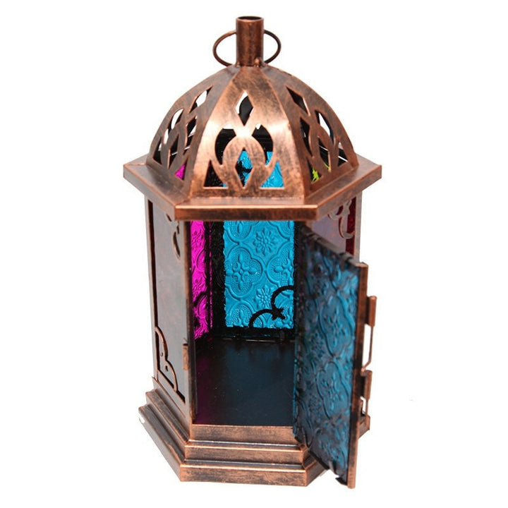 Metal lantern with a brushed copper finish an 6 glass windows in a contrasting stained finish. Door open.