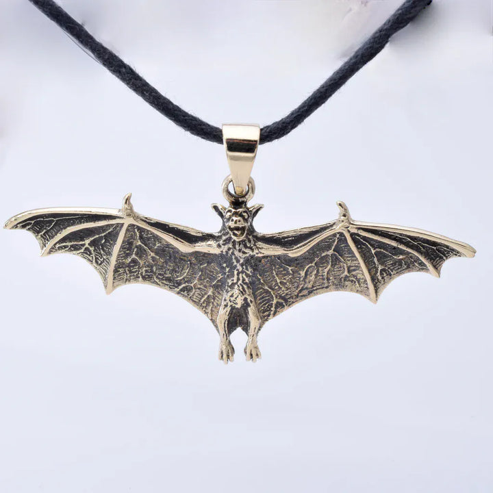 Solid bronze bat pendant