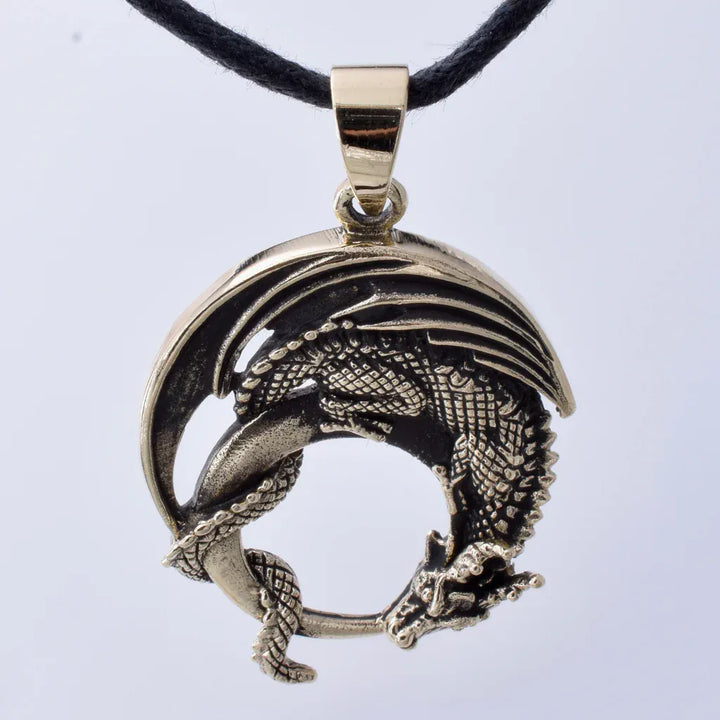 Solid bronze curled dragon pendant