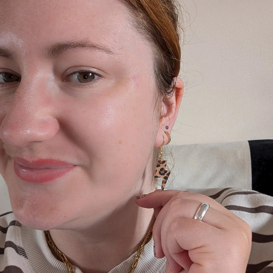 Mini leopard print lightning bolt earrings