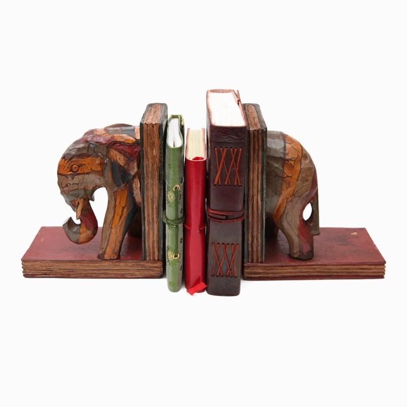 Carved wooden bookends in the shape of an elephant