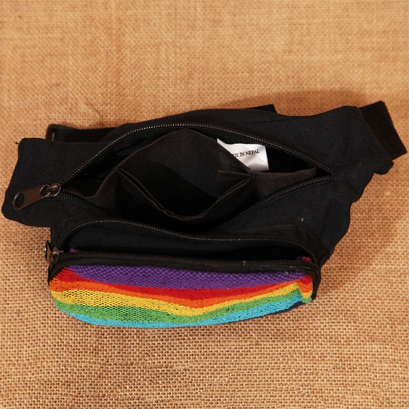 Rainbow Festival Bum Bag, mainly black with a front rainbow pannel, two zip pockets and adjustable waist strap, view with zips open.